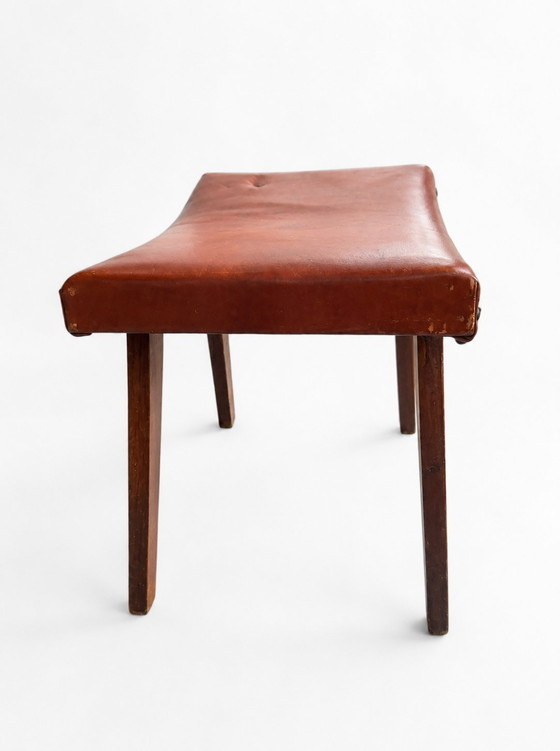 Image 1 of 1960s Mid-Century Brutalist Cognac Leather Saddle Ottoman Tapered Wood Stool