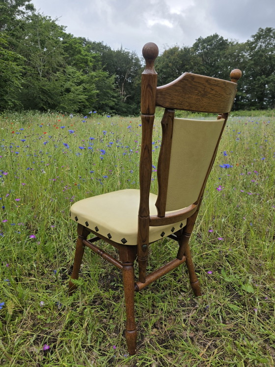 Image 1 of Set of 2 solid oak chairs with decorative nails