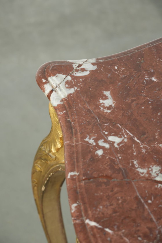Image 1 of Antique French side table/center table from the 19th century with a gold-colored wooden frame and an original marble tabletop.
