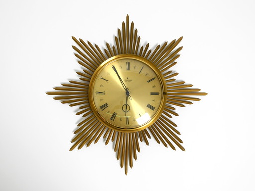 Prachtige grote originele messing zonnestraal wandklok uit 1960 van Junghans ATO-MAT