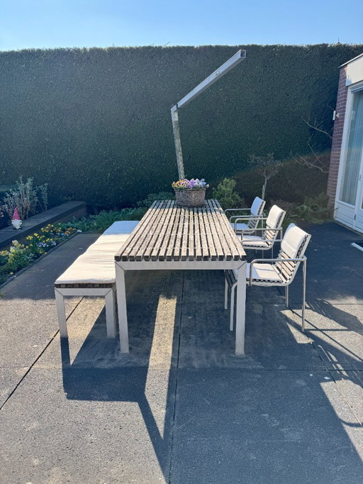 garden set, table, 3 chairs and 2 garden benches