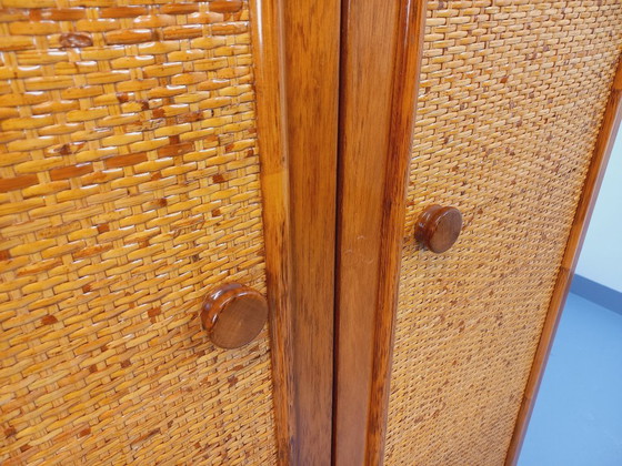 Image 1 of Armadio vintage Maugrion in rattan intrecciato e legno per Roche-Bobois, risalente agli anni '70.