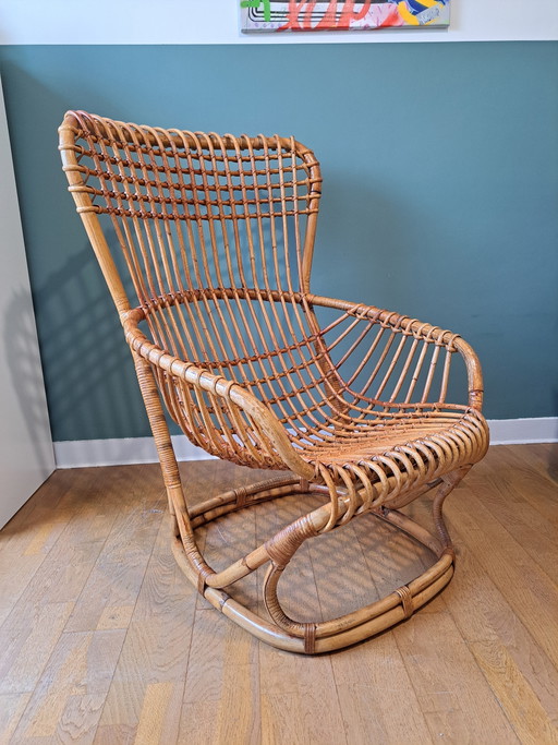 Sillón de ratán de Tito Agnoli