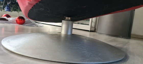 Image 1 of Leolux Parabolica swivel armchair in red leather