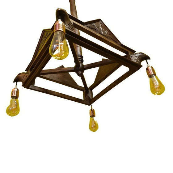 Image 1 of Lámpara colgante francesa de madera con cabezas de águila de alrededor de 1900