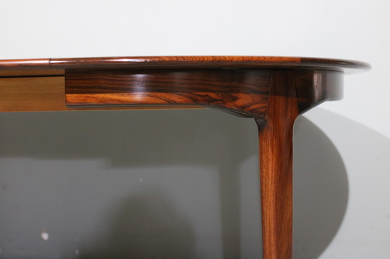 Image 1 of Table de salle à manger extensible en bois de rose par Henning Kjaernulf