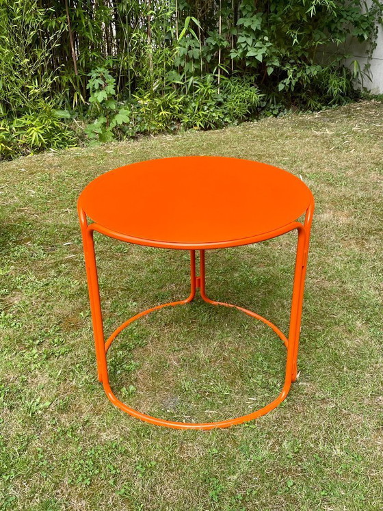 Image 1 of Gae Aulenti - oranje gelakte tuintafel