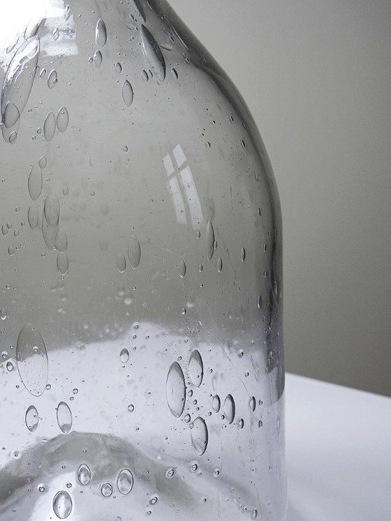 Image 1 of Large antique bottle in blown glass with bubbles, early 20th century, 1900-1920