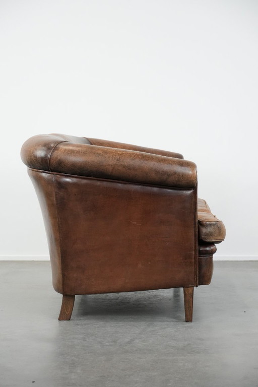 Vintage 2-seater sofa made of cognac-colored sheepskin in English style