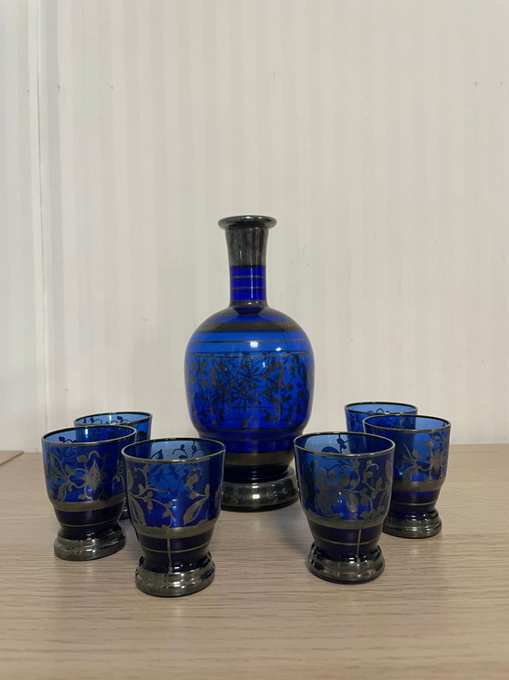 Image 1 of Rosolio-fles: 1 fles en 12 met zilver versierde glazen.