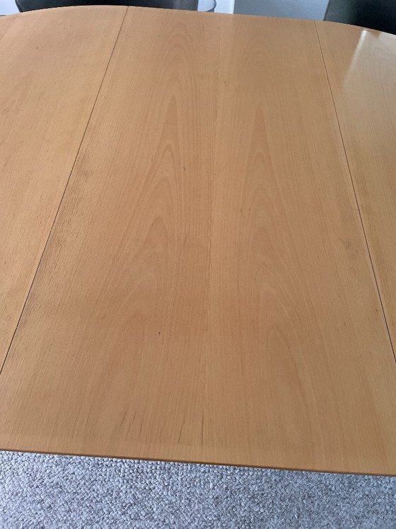 Image 1 of Oval Arco table with granite base