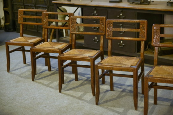 Image 1 of Set van 6 eikenhouten stoelen in de stijl van Pierre Cruège, jaren 1940.