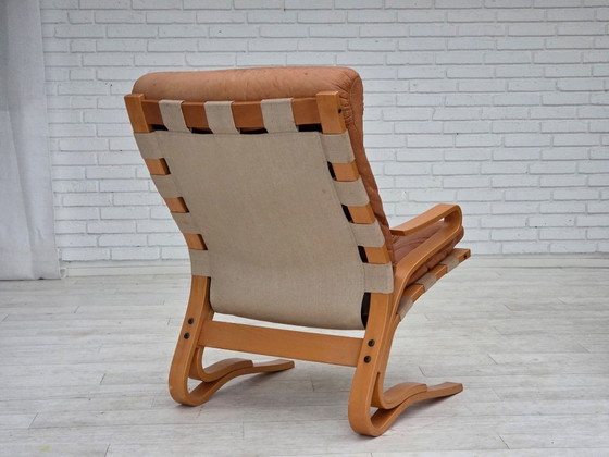 Image 1 of Noorse fauteuil uit de jaren 70, model "Kengu", meubelleer.
