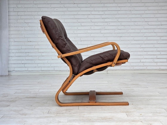 Image 1 of Fauteuil danois des années 1970 de la marque Komfort, cuir, toile et bois courbé.