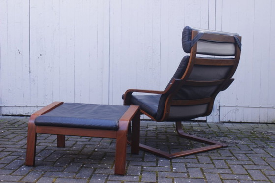 Image 1 of Ikea Vintage - Ikea POÄNG recliner and footstool in black leather, Scandinavian design, 1990s