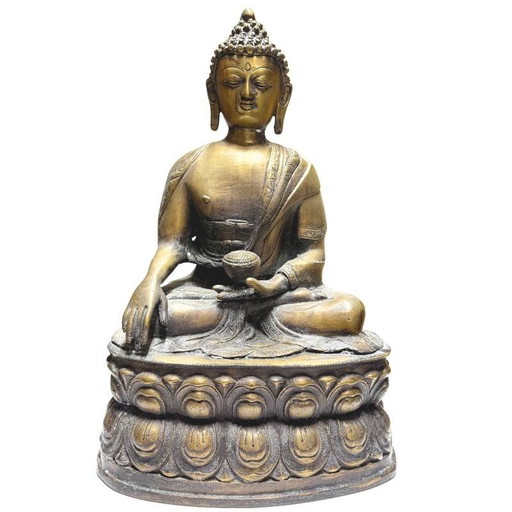 Estatua de Buda nepalí de bronce dorado al fuego sobre un trono de doble loto, siglos XVIII-principios del XIX