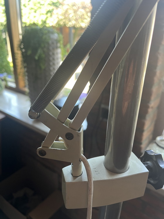 Image 1 of Solid professional mobile examination/work lamp.
1980s-1995