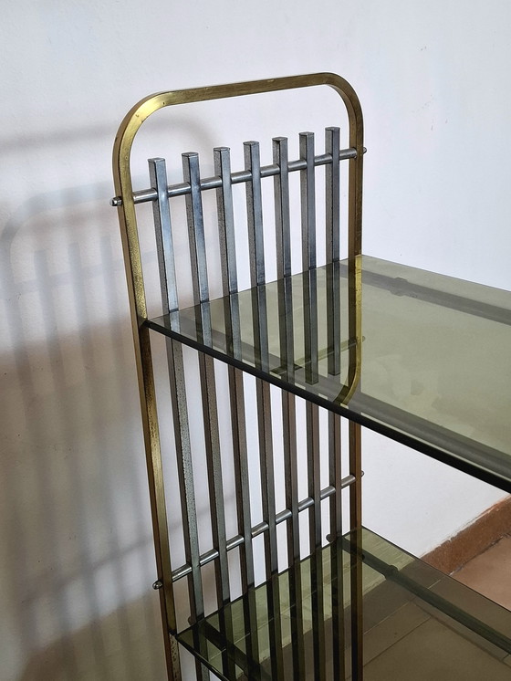 Image 1 of Italian shelf in chromed metal, brass and glass. 1970s.