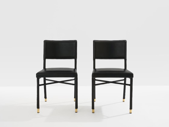 Image 1 of Jacques Quinet paar leren bijzettafels met zadelstiksel en messing details, 1950