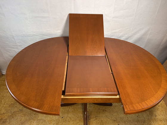 Image 1 of Mid-Century Retro Vintage Teak Extending Round Dining Table by Parker Knoll – 1970  Elegant | Space-Saving | Practical | Iconic 
