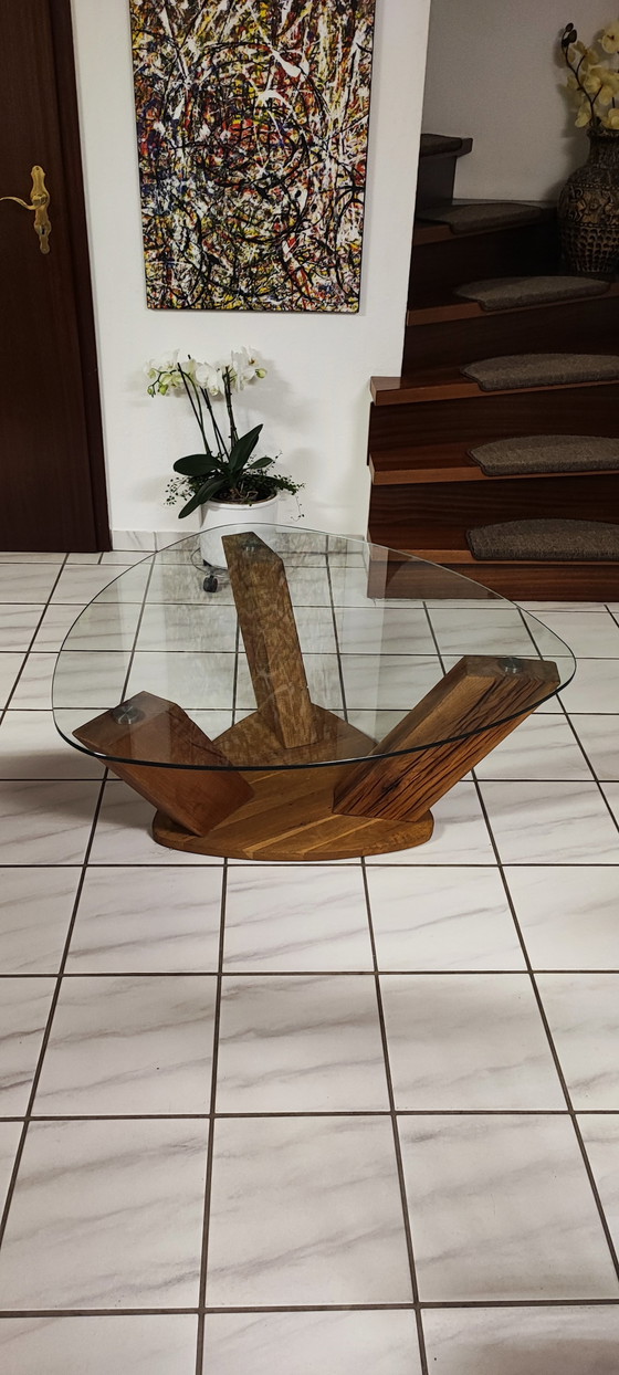 Image 1 of Couchtisch mit Glasplatte & Gestell aus
massiver Wildeiche