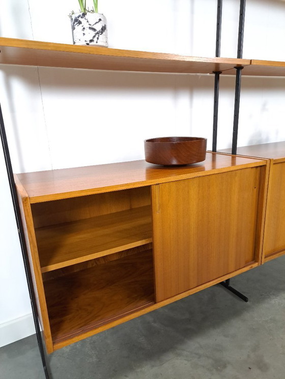 Image 1 of Parete componibile Omnia, Hilker, teak e acciaio nero con ripiani e contenitori