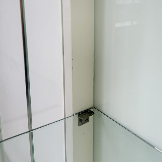 Image 1 of White vintage slatted display case on gold legs