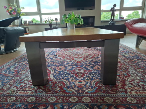 Dining room and coffee table, light oak with stainless steel base.