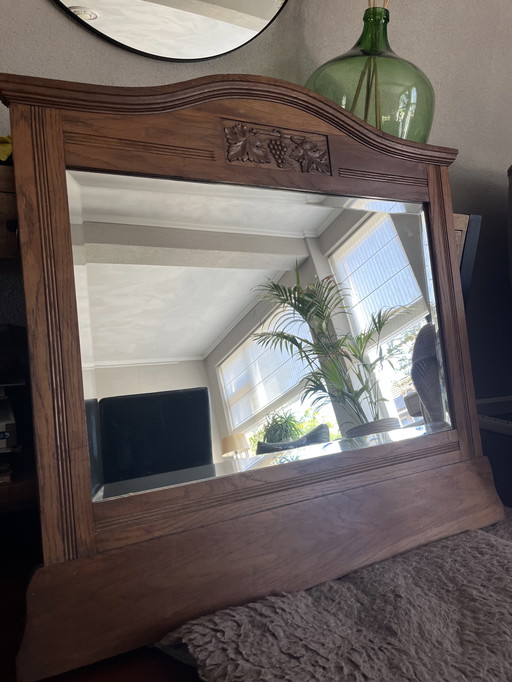 Antique heavy wooden faceted mirror
