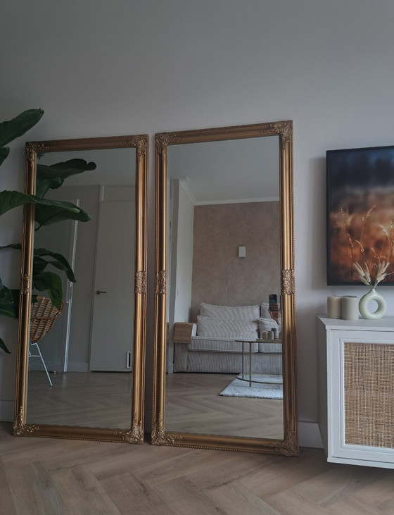 Image 1 of 2 grote antieklook spiegels met goudbronze lijst