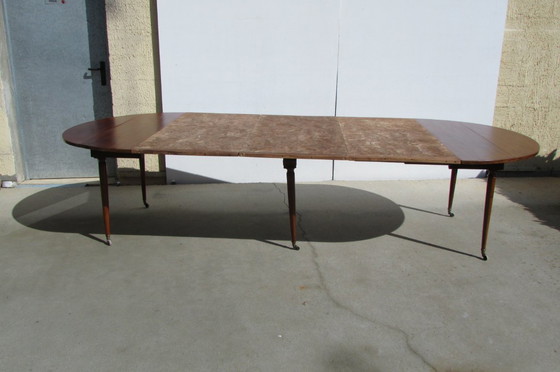 Image 1 of Beautiful antique round table, 6 tapered mahogany legs, extendable