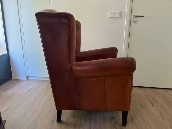 Image 1 of Poltrona con orecchie in pelle