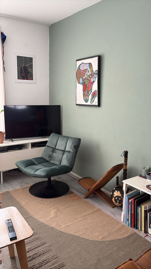 Bellissima poltrona di design verde scuro "DUTCHBONE"