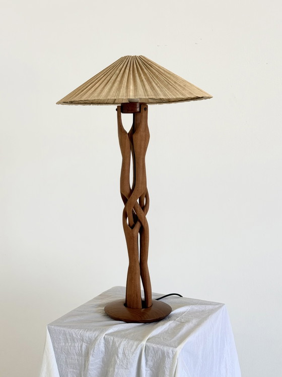 Image 1 of Sculptural hand-carved table lamp made of solid teak wood