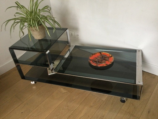 Mesa de centro / Mueble bajo de diseño italiano en cristal ahumado y acero cromado.