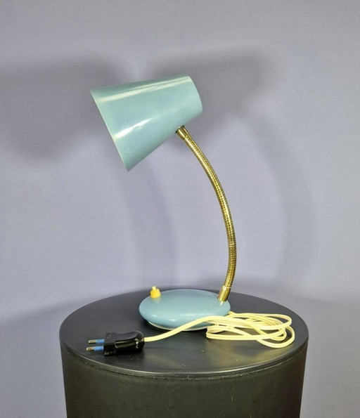 Massive desk lamp in light blue pastel.