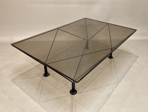 Design coffee table in glass and metal.