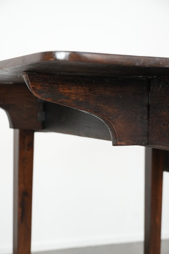 Image 1 of Antique English drop-leaf side/dining table made of oak from the 19th century with a drawer.