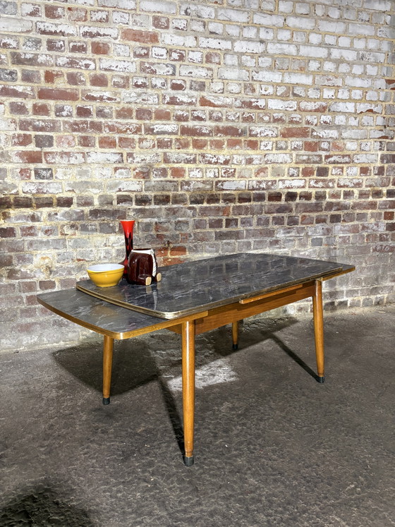 Image 1 of Uitschuifbare salontafel van teak en formica