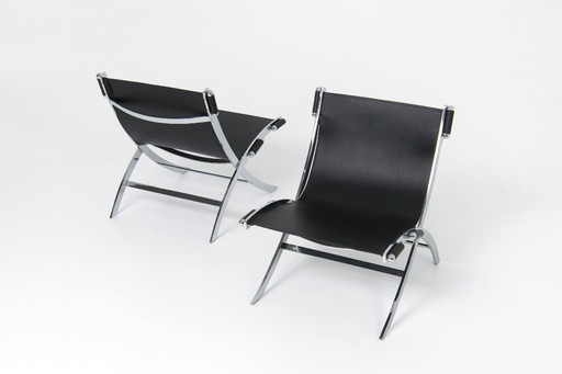  Een set schaarstoelen - Paul Tuttle & Antonio Citterio