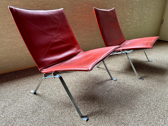 Poul Kjærholm PK 22 E. Kold Christensen Ensemble de 2 fauteuils lounge, Cuir, polished steel, Rouge (photo 2 sur 10)