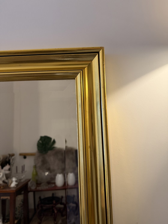 Image 1 of Large facet-cut mirror in a gold-colored frame