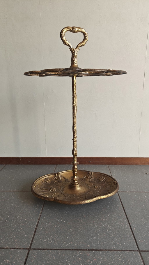 Soporte para paraguas de latón con decoración de serpiente