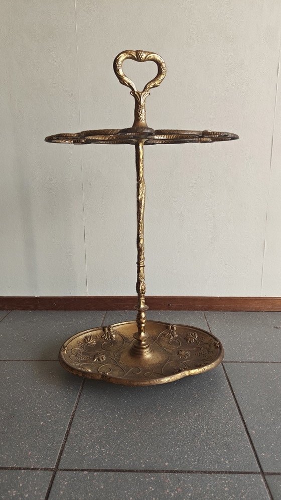 Image 1 of Soporte para paraguas de latón con decoración de serpiente