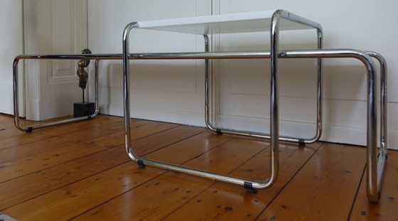 Image 1 of 2 tables design en tubes chromés