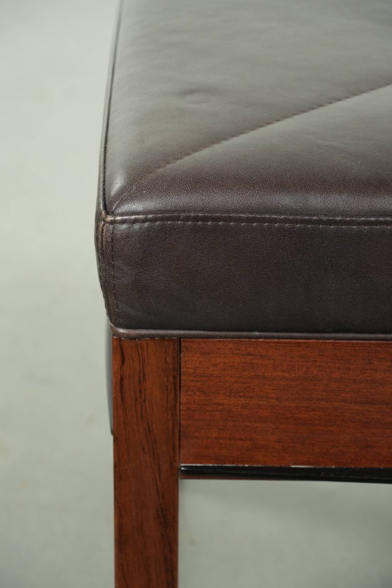 Image 1 of Chocolate brown cowhide Schuitema Art Deco design ottoman/footstool from the Decoforma series