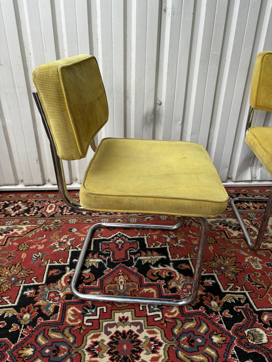 Image 1 of Vintage buisframe eetkamerstoelen