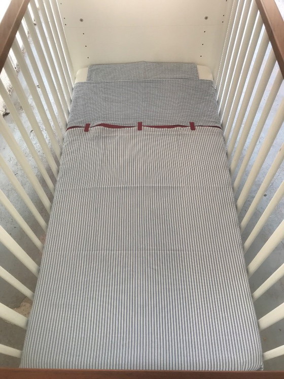 Image 1 of Cot convertible into junior bed, box spring, mattress, sheets, Hülsta Casalino model.