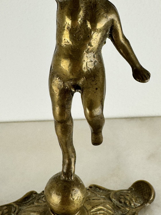 Image 1 of Antique bronze figurine of playing child - decorative and rare