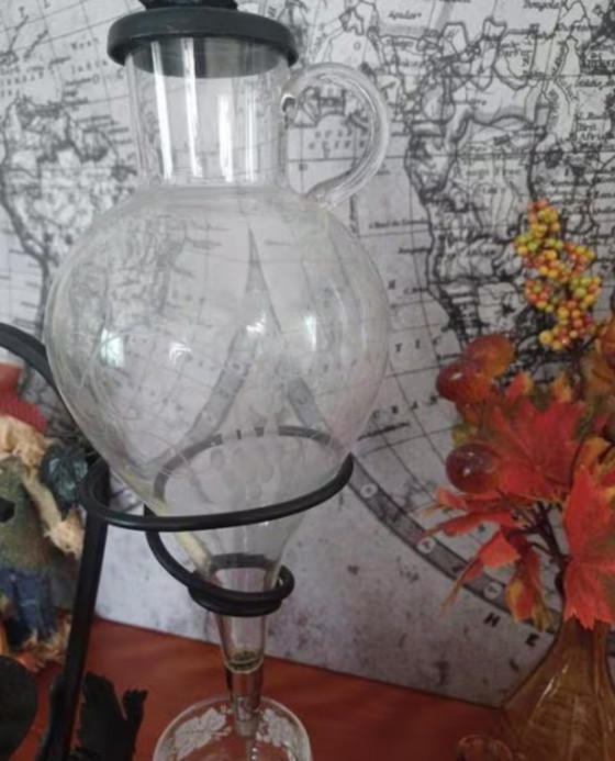Image 1 of Vintage wrought iron wine decanter/carafe from the mid-20th century - Austrian Weinheber glass carafe with wine leaf base